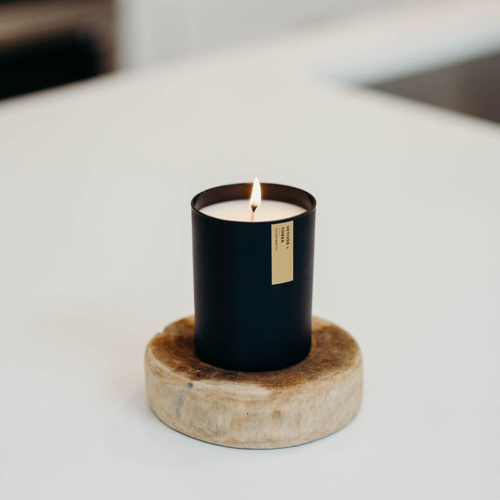 Calyan Wax Co Vetiver & Tonka candle creates relaxing bedroom ambiance