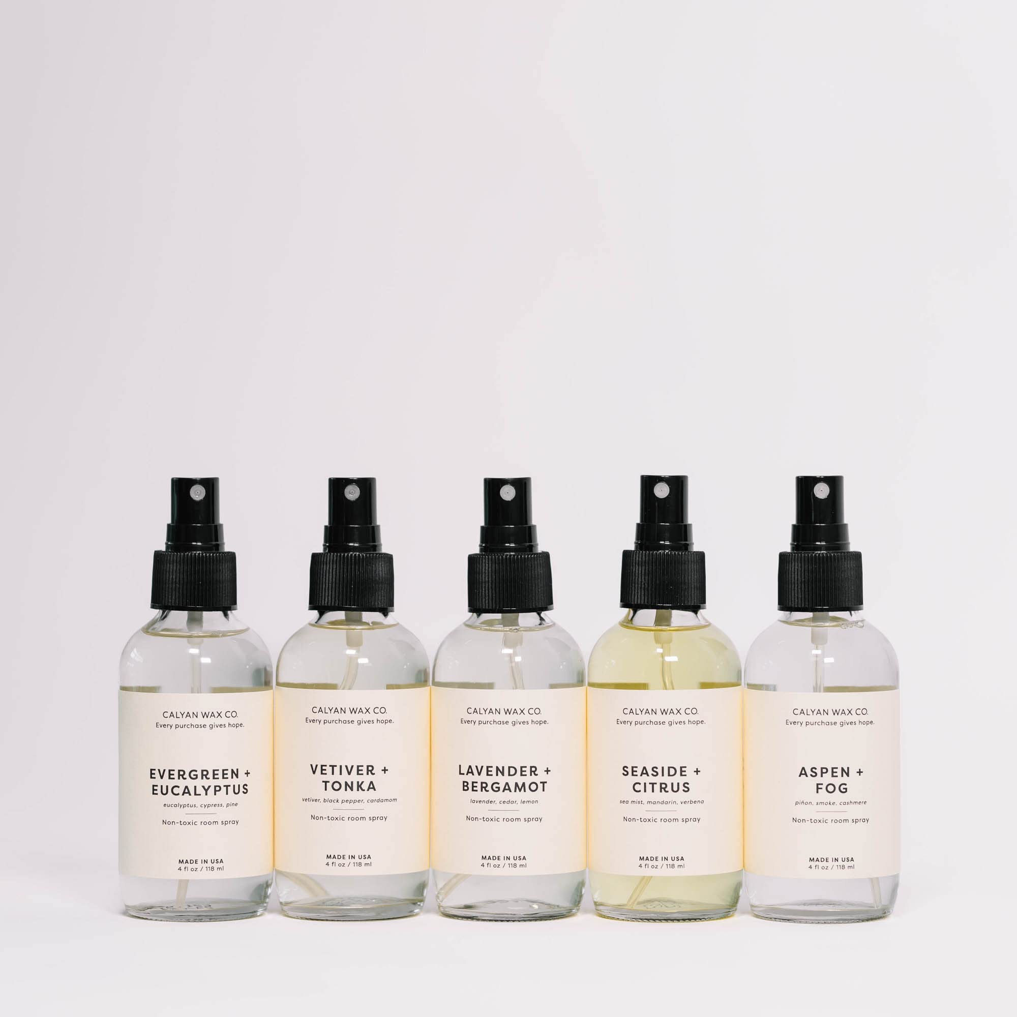 Living room setup with Vetiver & Tonka room spray creating inviting atmosphere