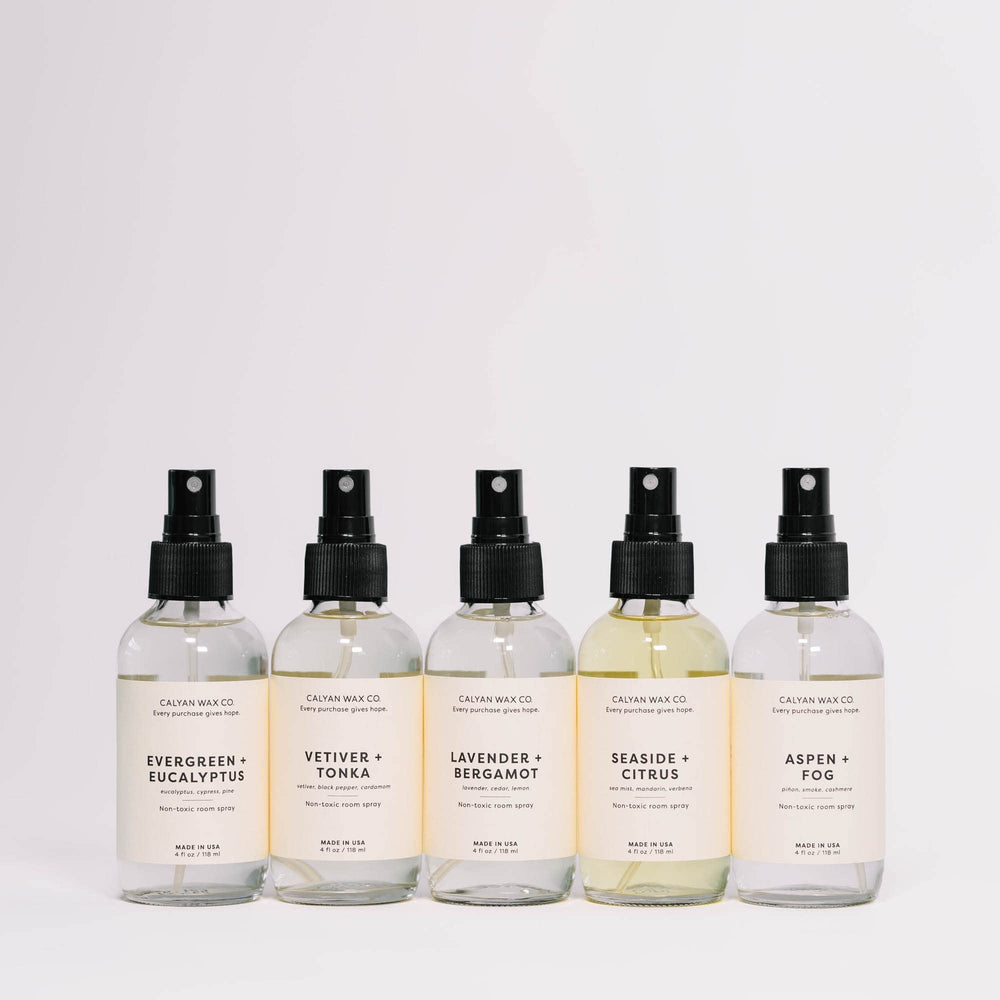 Living room setup with Vetiver & Tonka room spray creating inviting atmosphere