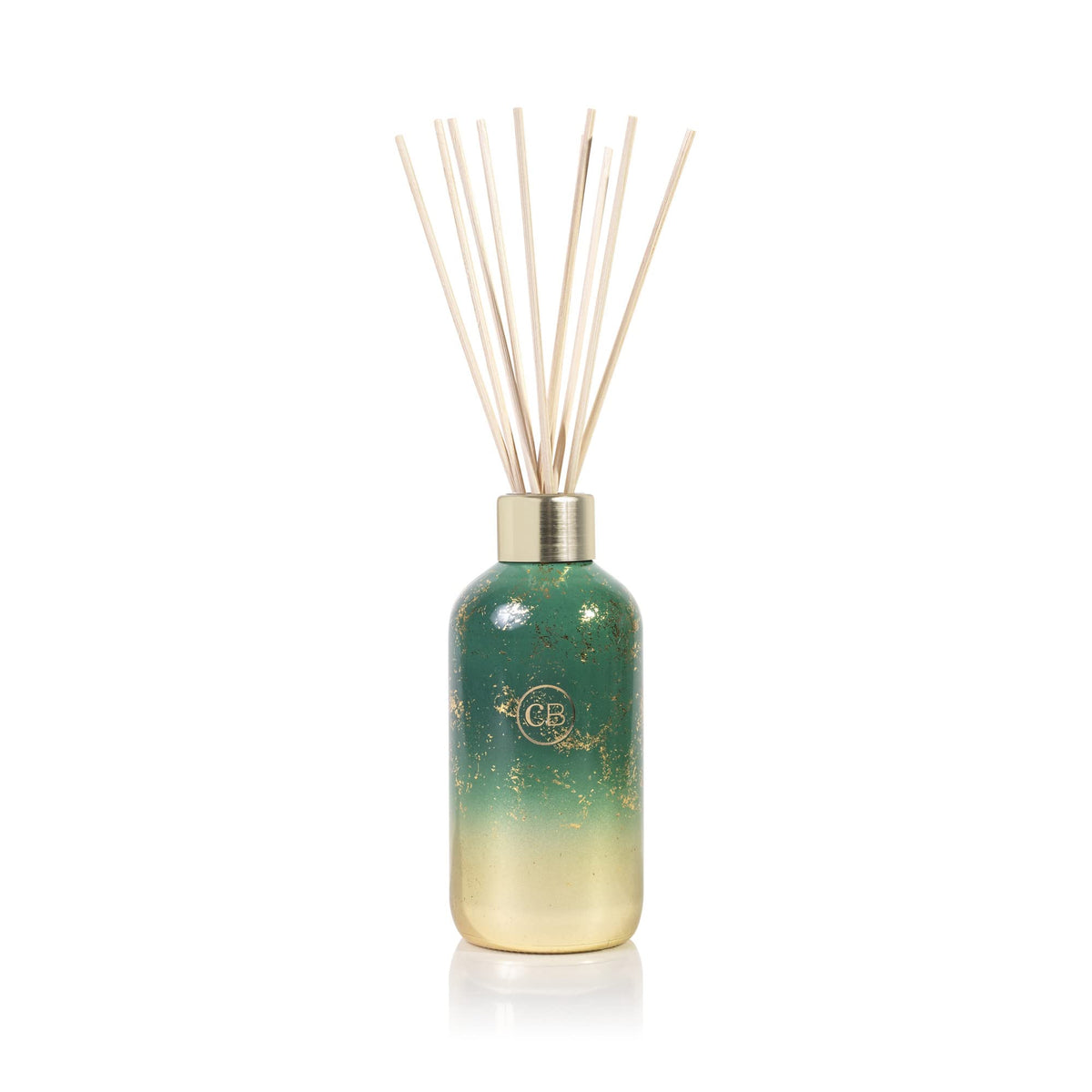 Capri Blue Glimmer diffuser bottle with amber glass for long-lasting room fragrance.
