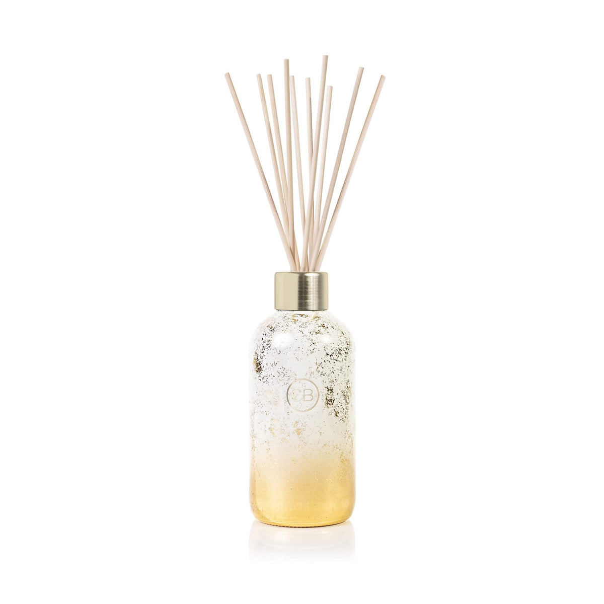 Capri Blue Glimmer diffuser in Volcano scent with winter design enhances living room ambiance
