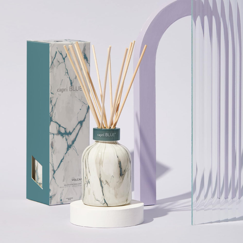 Capri Blue Modern Marble diffuser sticks shown with Volcano fragrance for even diffusion.
