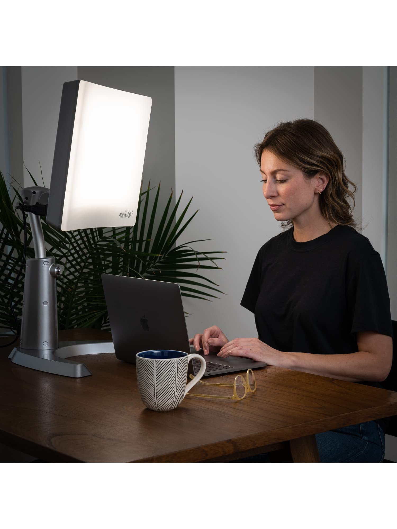 Carex Day-Light Classic Plus emitting light at a 12-inch distance for safety.