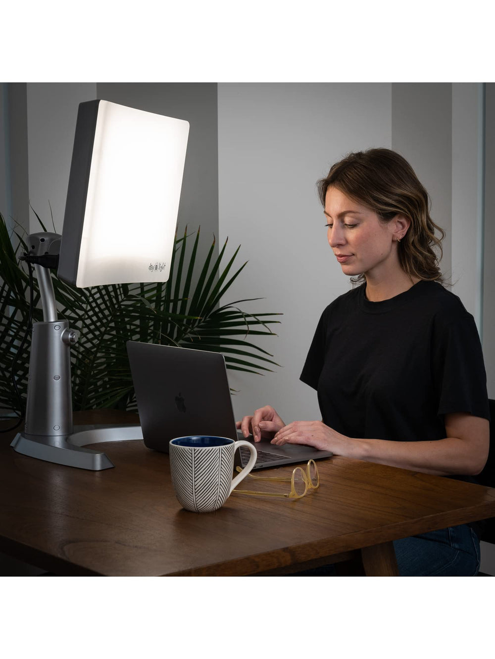 Carex Day-Light Classic Plus emitting light at a 12-inch distance for safety.