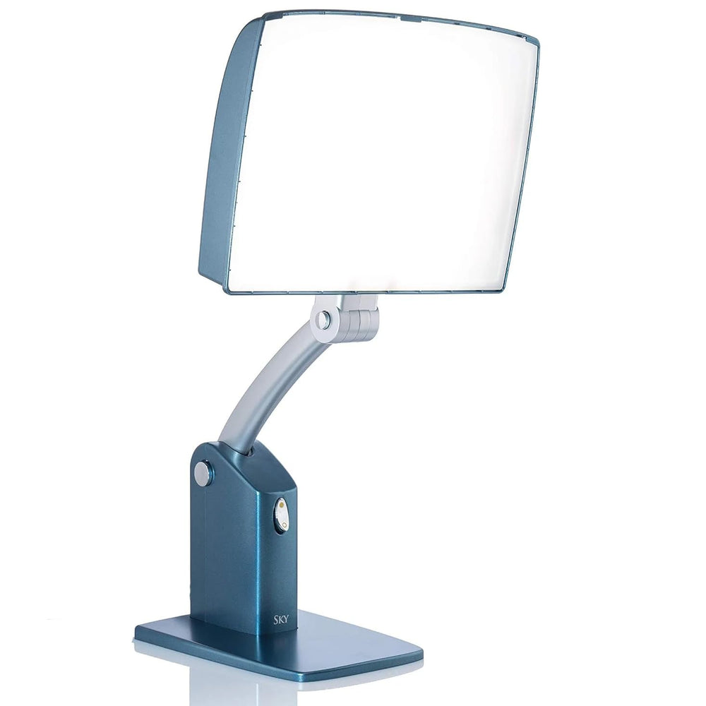 Carex Day-Light Sky front view lamp demonstrates 10000 lux brightness for morning routines.