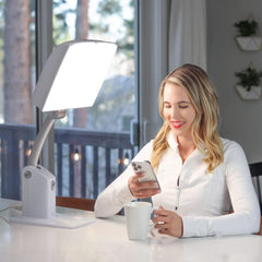 Carex Day-Light Sky lamp 10k-lux setting close-up, bright therapy-level light.