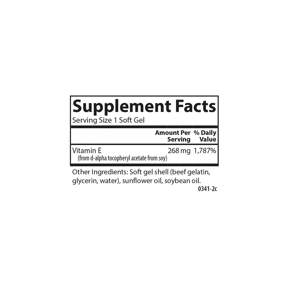 Softgel in hand showing compact, portable daily supplement.