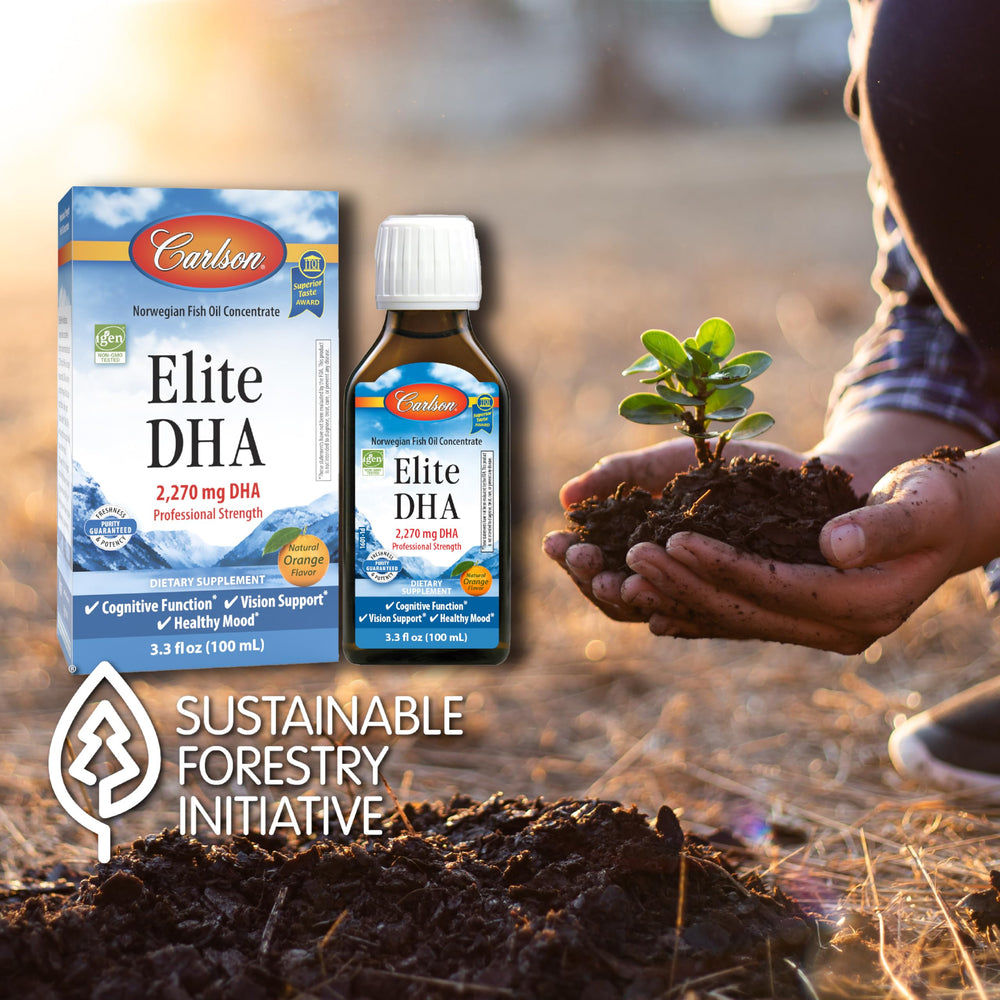A spoon with orange DHA oil, highlighting delicious flavor.