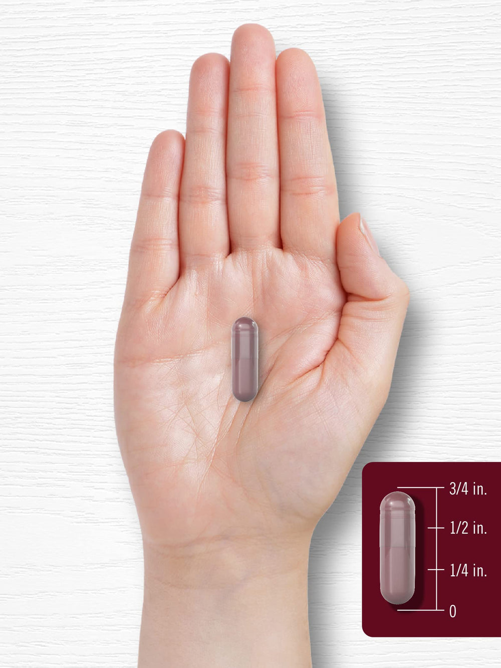 Glass of water with Carlyle Black Cherry Extract capsules ready to take.