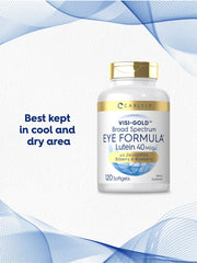 A hand holding Carlyle Eye Health softgels showing capsule size.