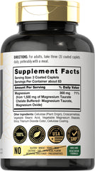 Carlyle Magnesium Taurate caplets close-up showing buffered coating for easy swallowing.
