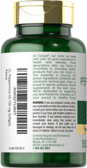 Pouring Carlyle Peppermint Oil Capsules from the bottle.