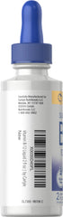 Berry-flavored Carlyle B12 drops splash into glass, convenient sublingual intake for busy mornings