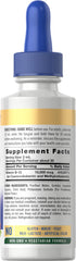 Dropper dispensing berry liquid from Carlyle B12 sublingual drops, precise 10,000 mcg per serving