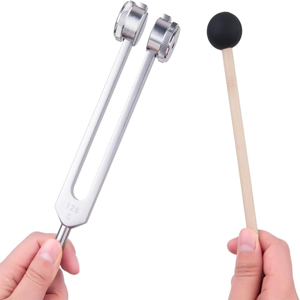 CBCJIEHUXL tuning fork near temples to explore tension relief through resonance.