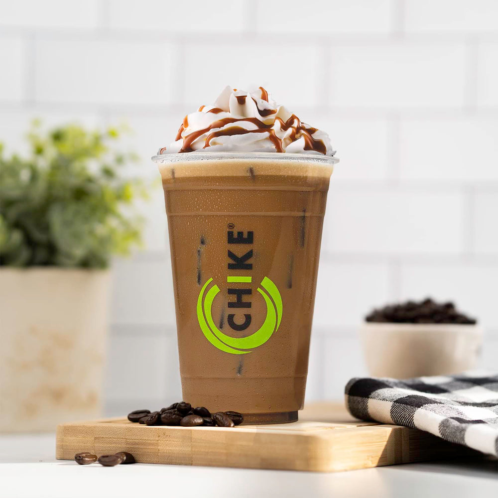 CHIKE Iced Coffee Original glass with ice, convenient protein-rich refreshment.