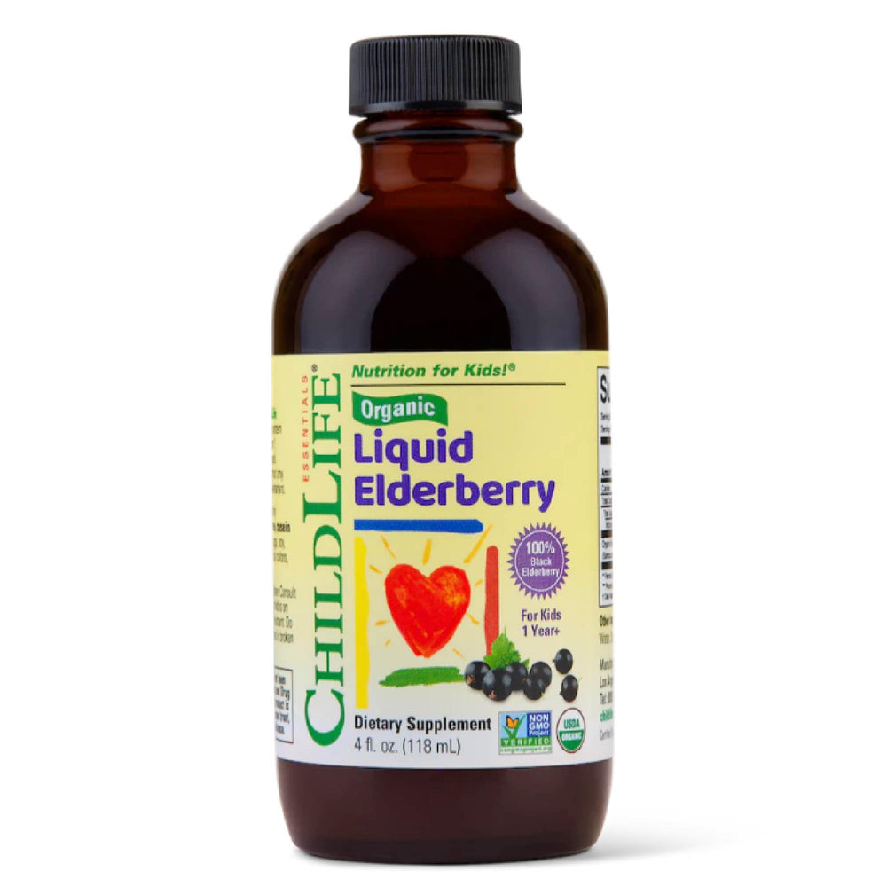 CHILDLIFE Essentials Organic Elderberry Syrup bottle on a kitchen counter for daily kid immune support.
