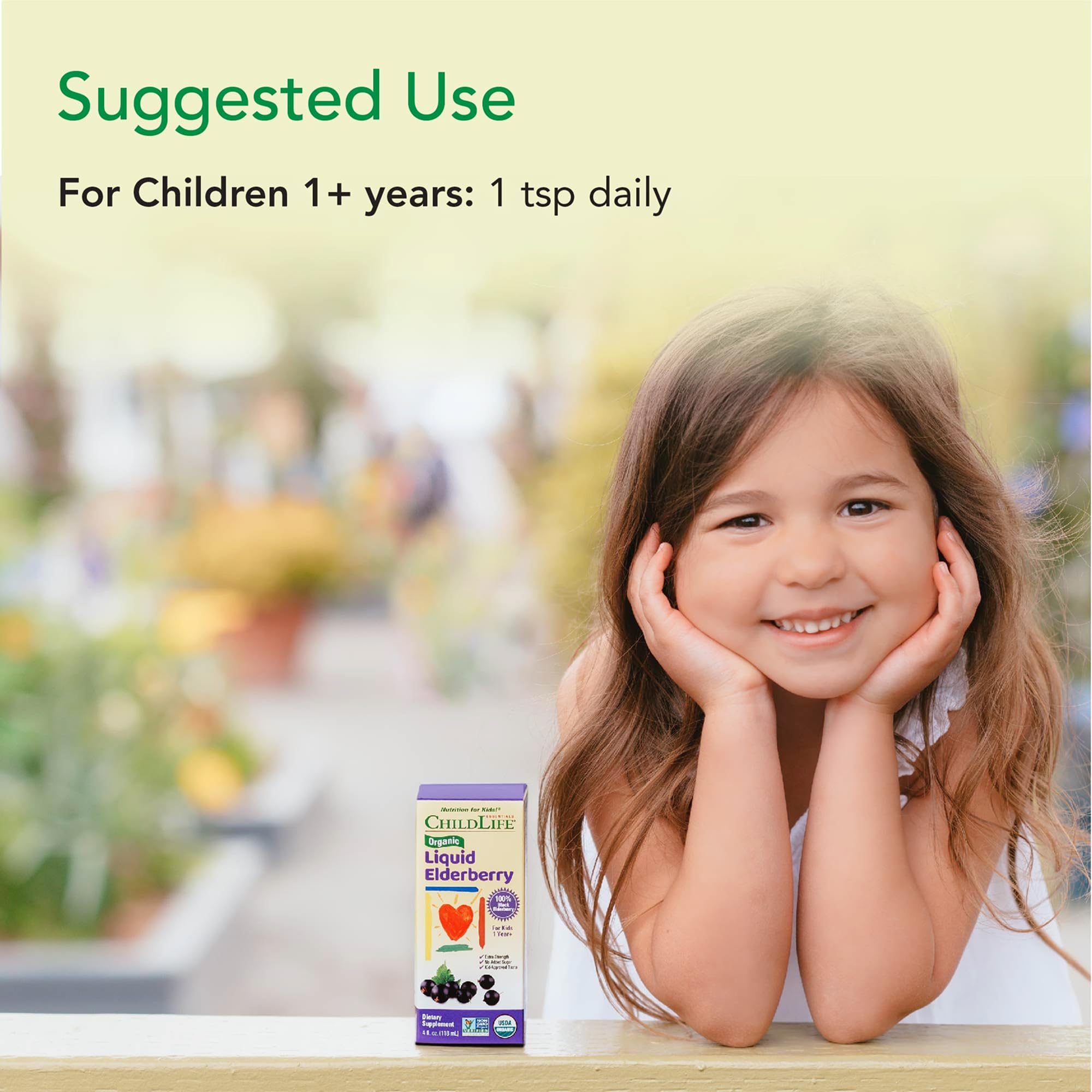 Kid-friendly daily routine with CHILDLIFE Essentials elderberry syrup on a breakfast table.
