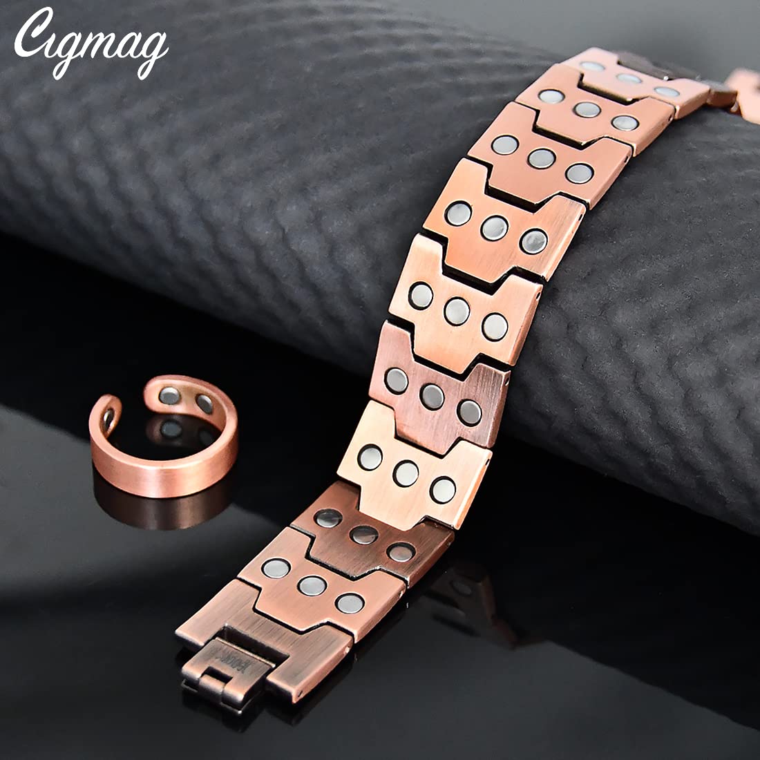 Cigmag open design adjustable copper bracelet on display.
