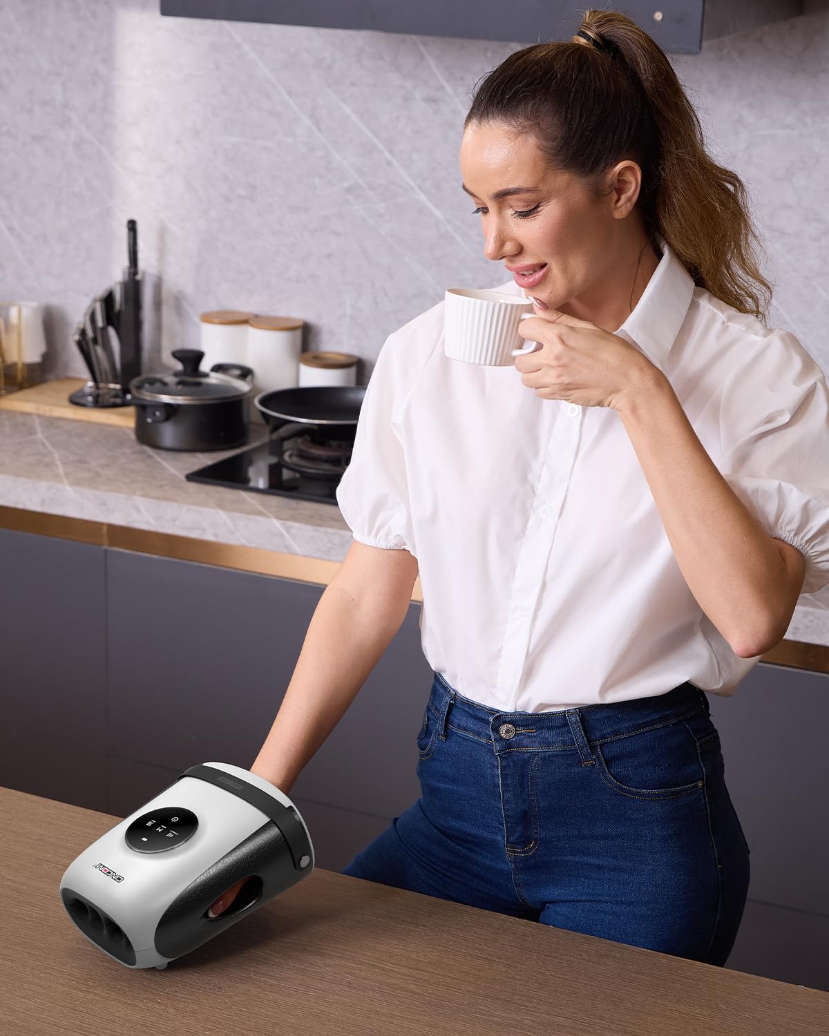 CINCOM Hand Massager uses air compression to ease palm tension.