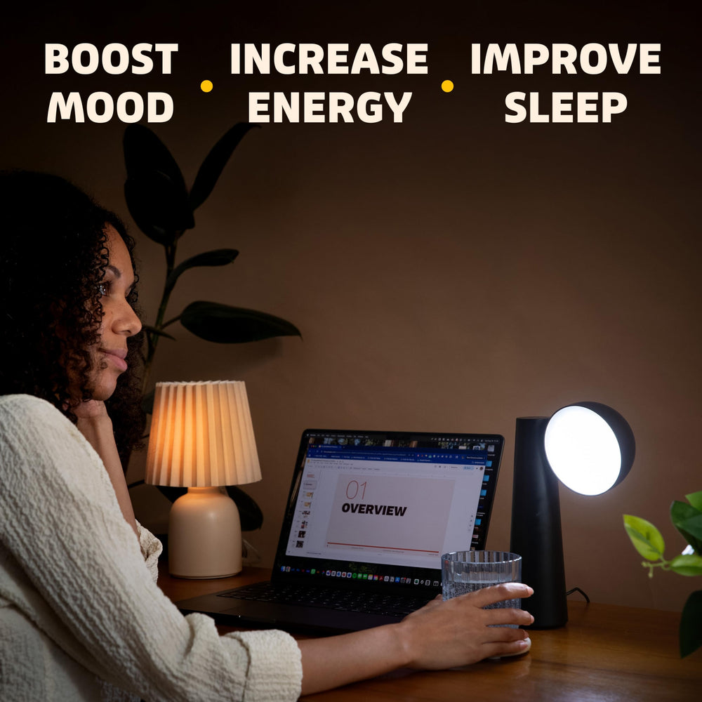 Circadian Optics Lora lamp in matte black design complements modern desks