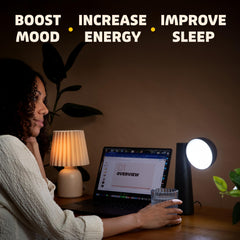 Circadian Optics Lora lamp in matte black design complements modern desks