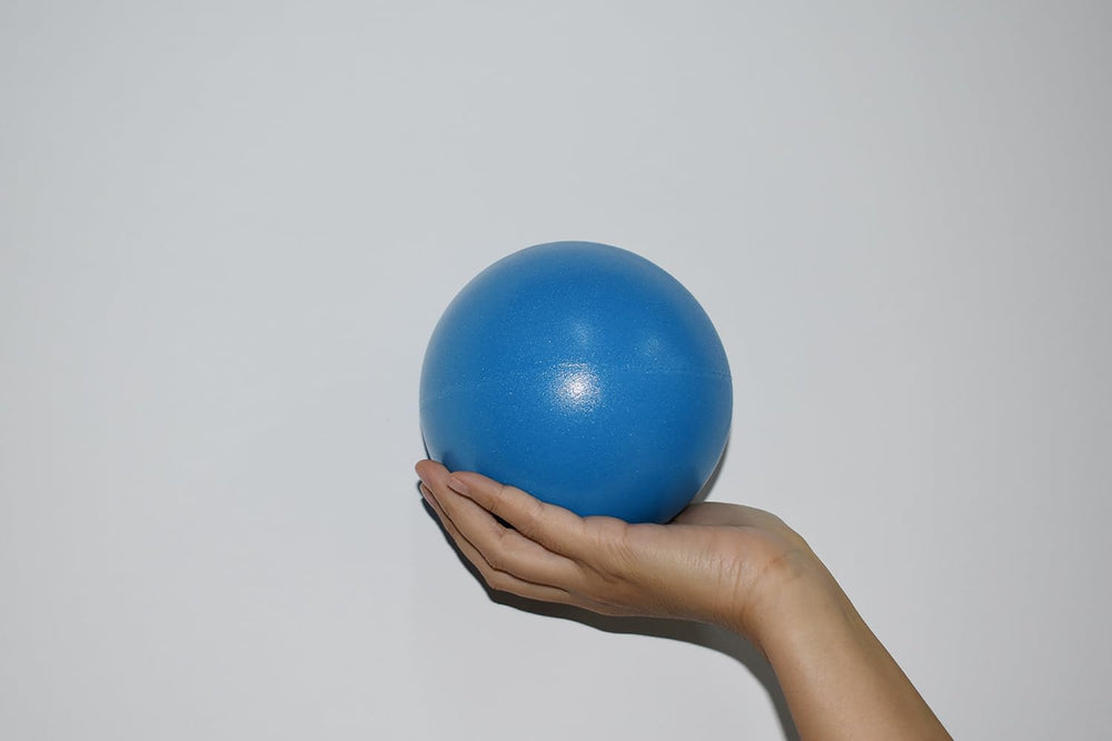 CIZEBO blue 4in ball not perfectly round, suitable for varied placement and grip.
