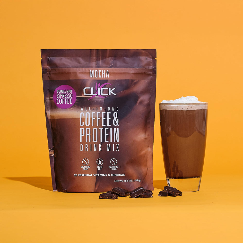 Morning desk setup featuring Click Coffee Protein bottle