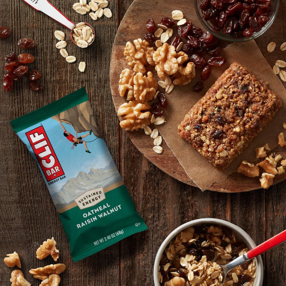 CLIF BAR packaging pictured on a hiking trail for portable energy.