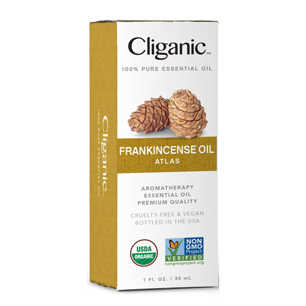 Cliganic Cedarwood oil diffuser setup creating a warm, woodsy atmosphere.