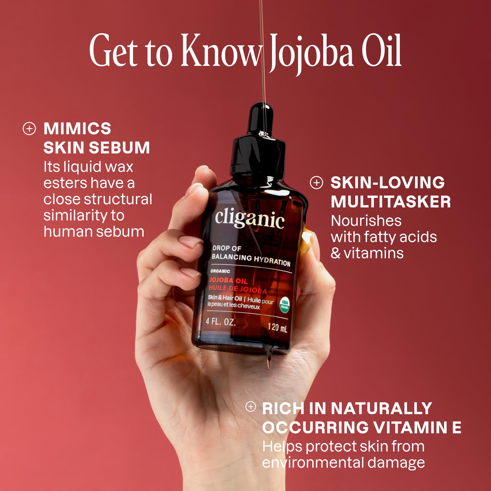 Cliganic Jojoba Oil bulk bottle showing golden liquid for premium care