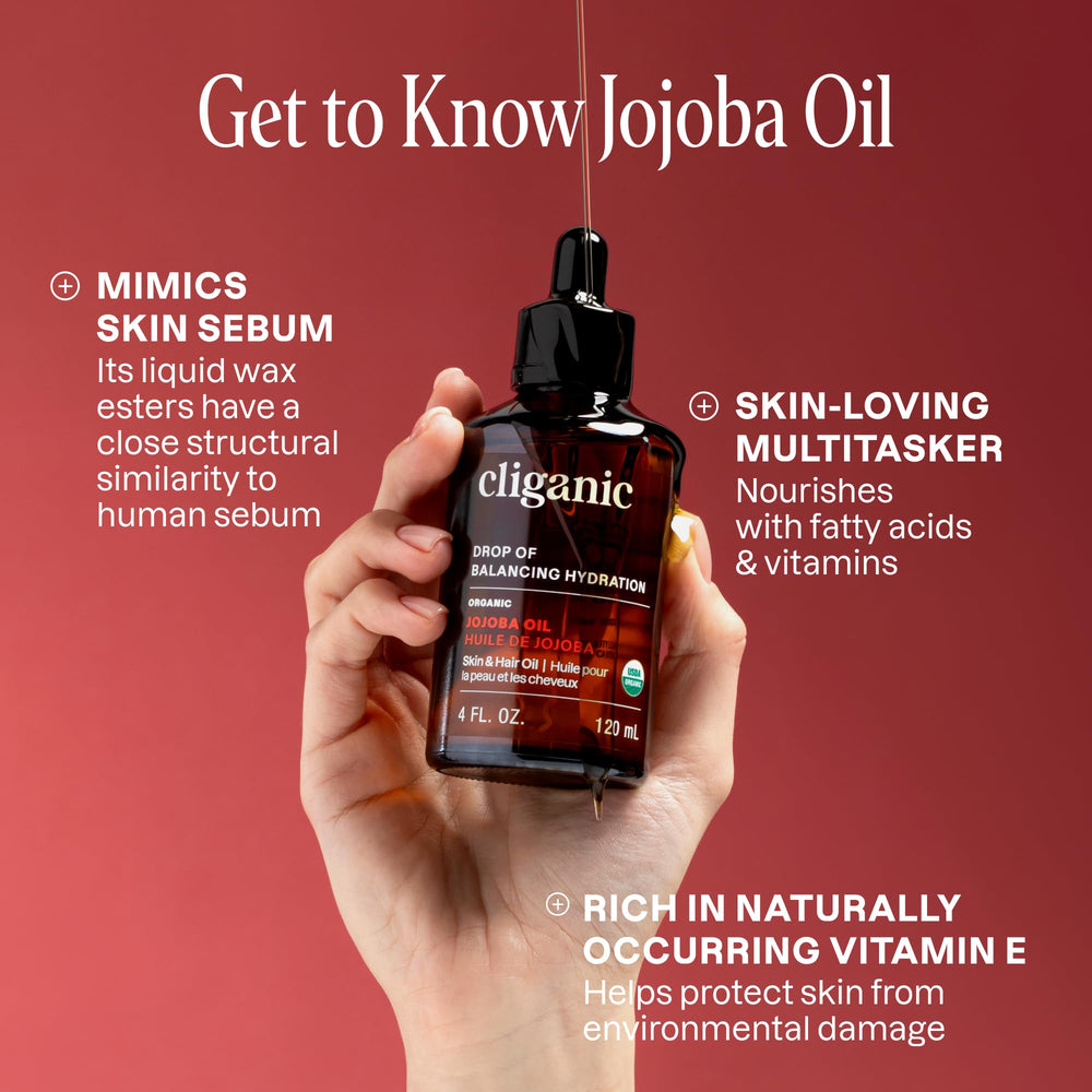 Cliganic Jojoba Oil bulk bottle showing golden liquid for premium care