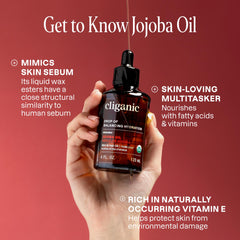 Cliganic Jojoba Oil bulk bottle showing golden liquid for premium care