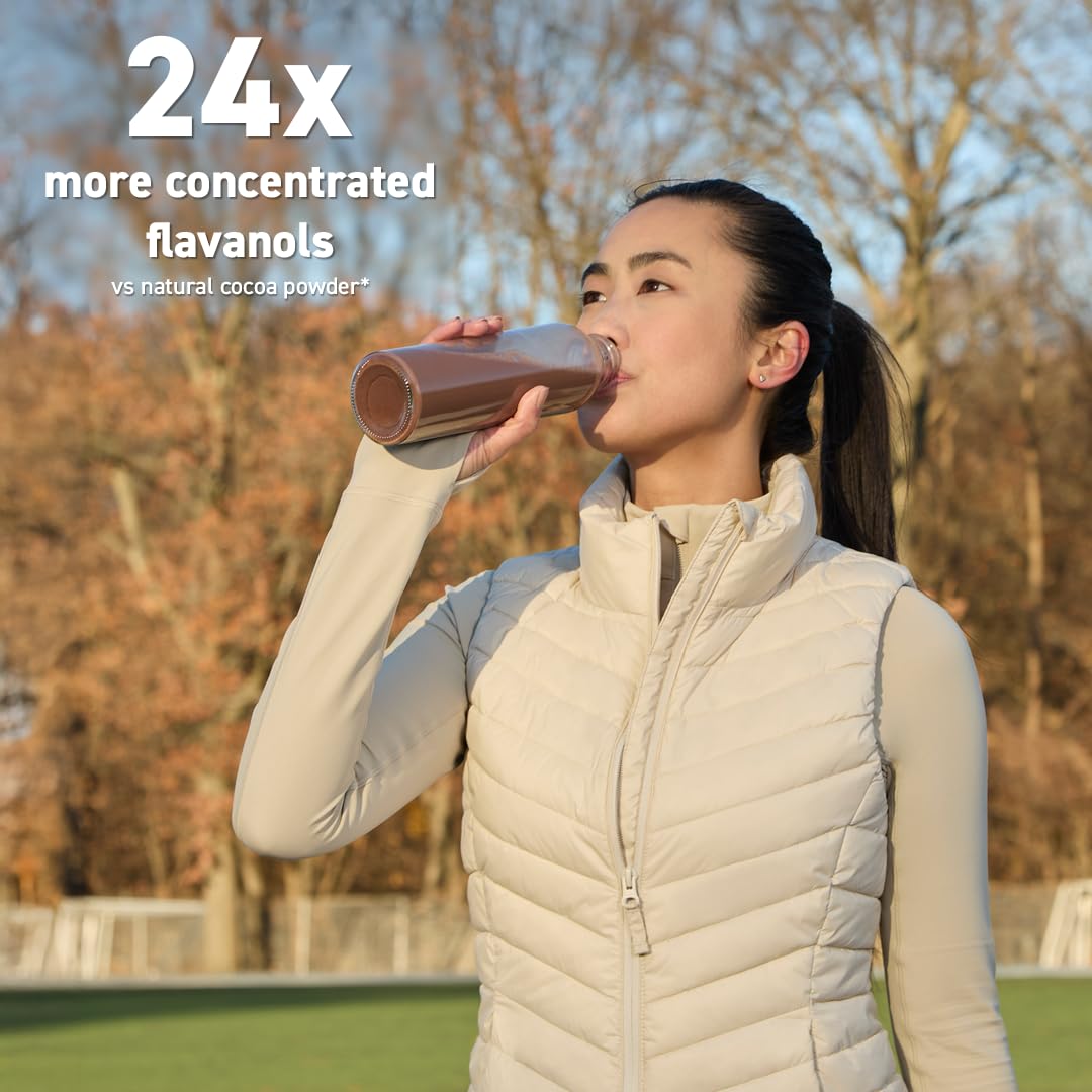 CocoaVia bottle partially opened with measuring scoop ready for daily use and heart-friendly routine.