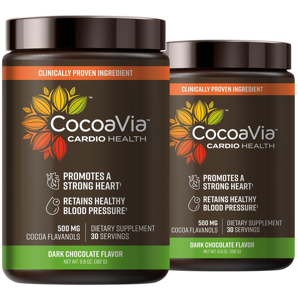 CocoaVia Cardio Health Cocoa Powder tub on kitchen counter suggesting daily cardiovascular support.