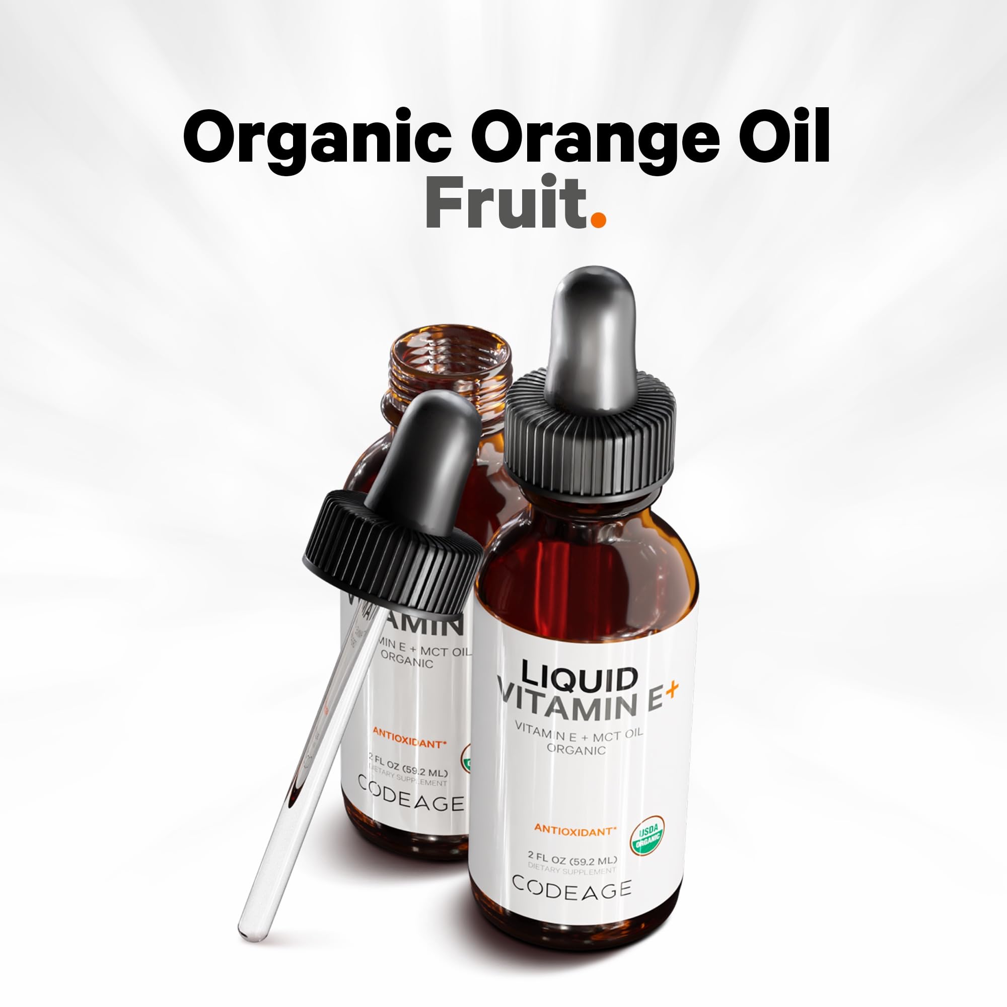 Orange fruit oil accent visible in Codeage E+ liquid