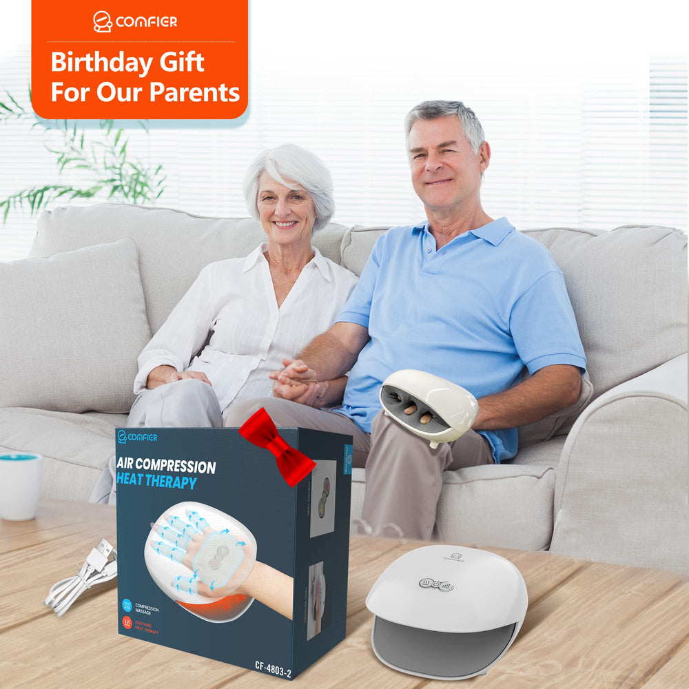 COMFIER hand massager charging via USB cable at home