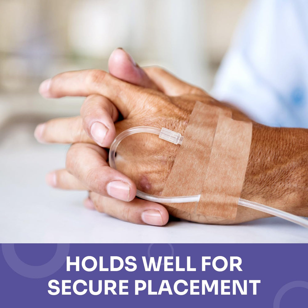 Conkote tan paper tape securing dressings and devices on skin.