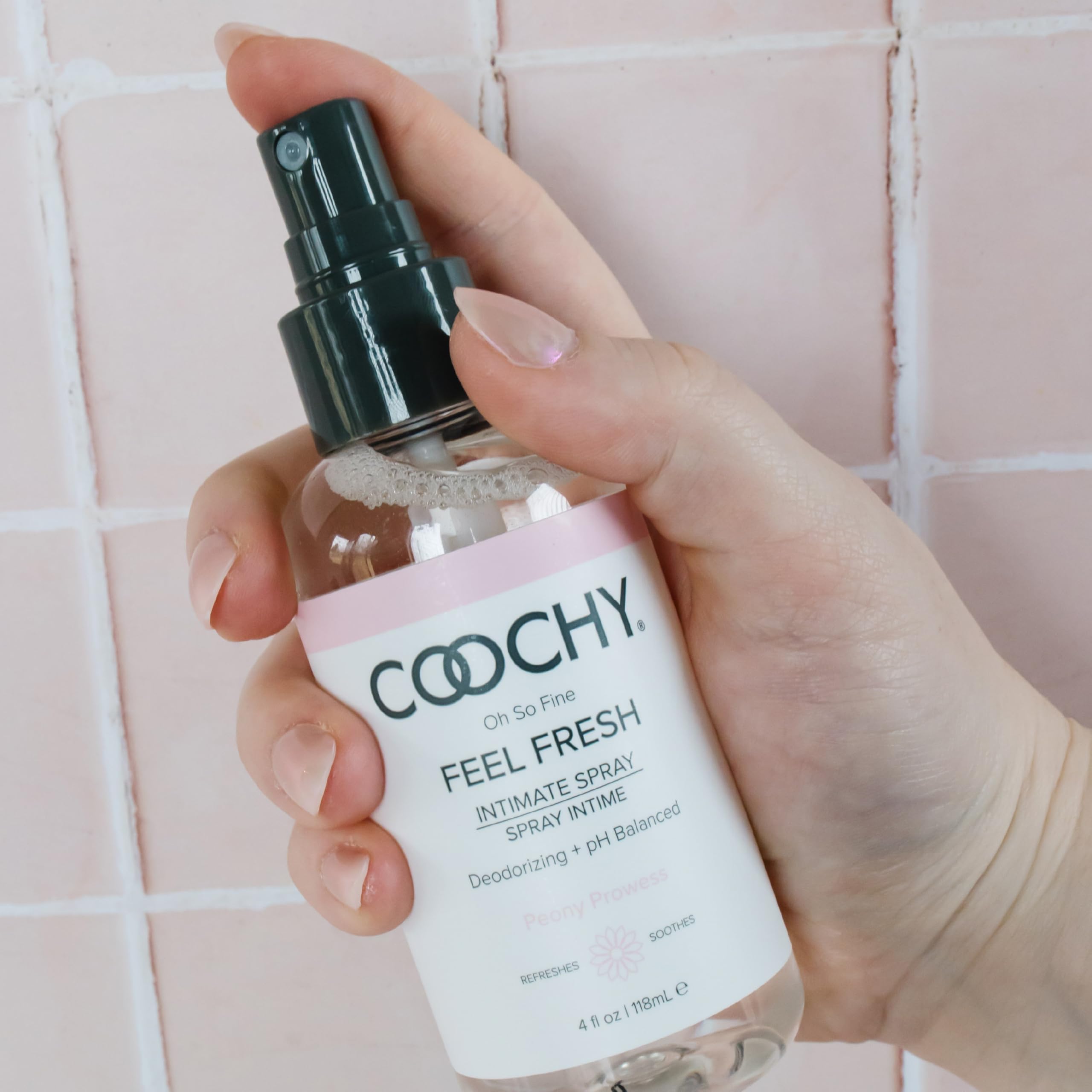 Coochy peony scent bottle emphasizes a soft, aromatic fragrance.