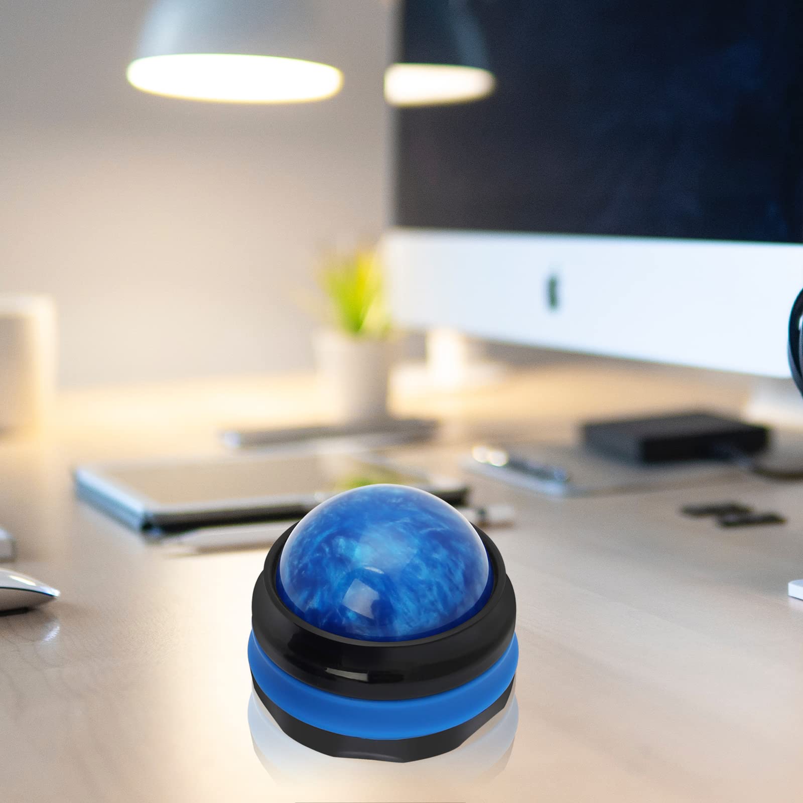 Coolrunner Massage Ball used on the foot to help ease soreness.