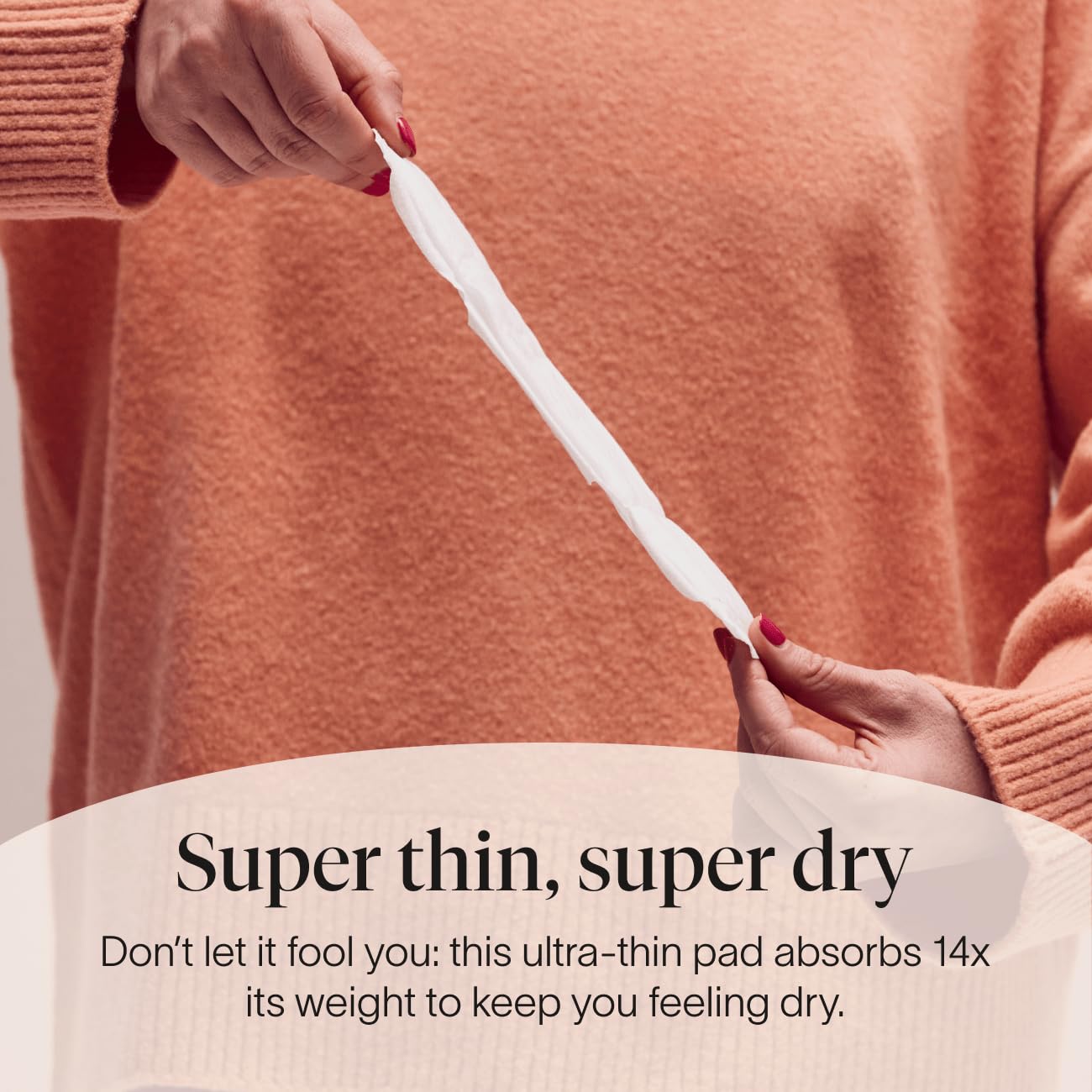 Cora organic topsheet close-up emphasizes chlorine-free and dye-free surface.