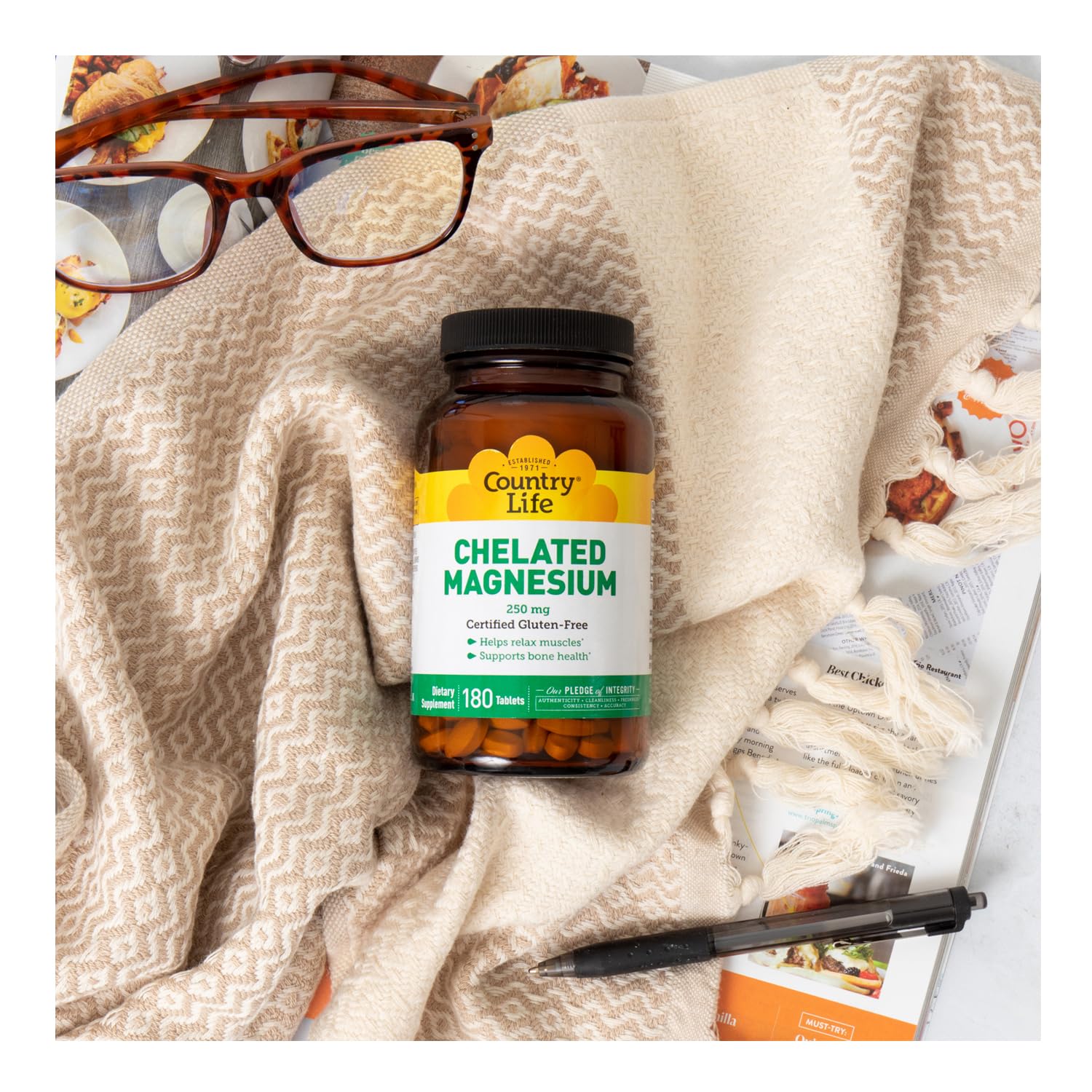 Country Life Chelated Magnesium 250mg gluten-free label on packaging.