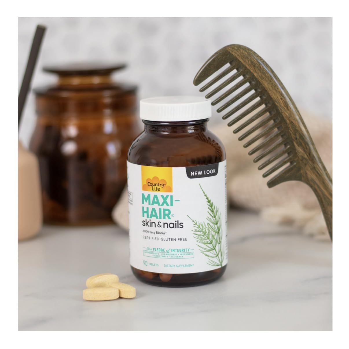 Country Life Maxi-Hair bottle pour showing easy daily supplementation.