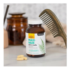 Country Life Maxi-Hair bottle pour showing easy daily supplementation.