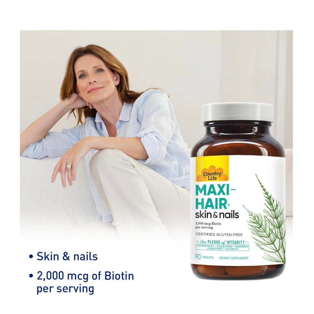 Country Life Maxi-Hair tablets close-up highlighting biotin for hair health.