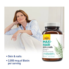 Country Life Maxi-Hair tablets close-up highlighting biotin for hair health.