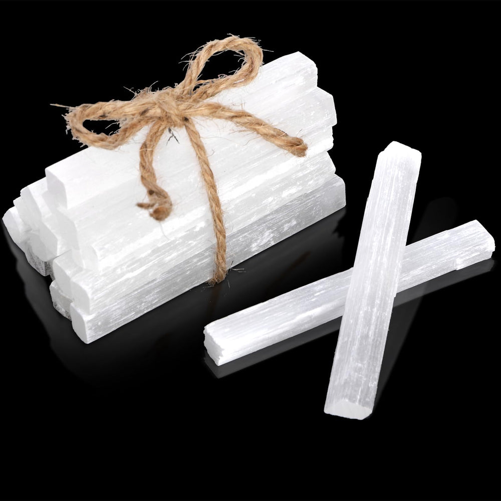 Covzoe selenite sticks on a desk for meditation focus.
