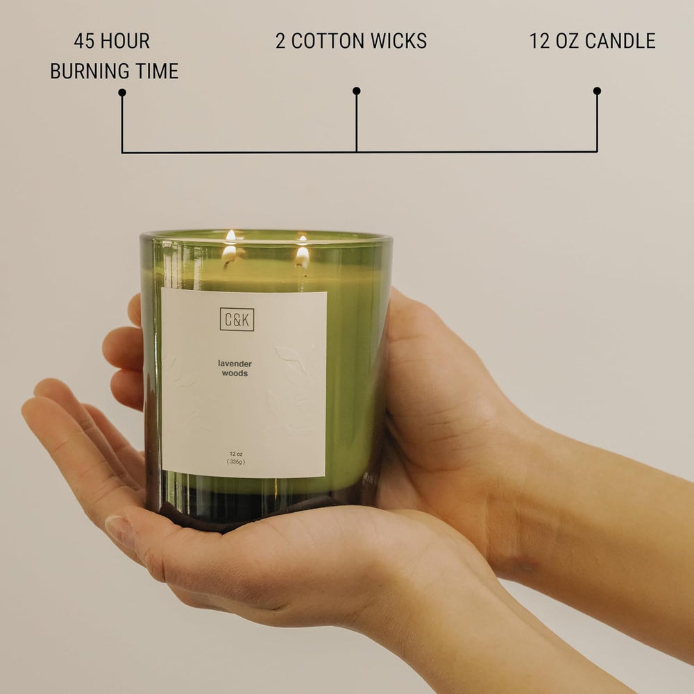Craft & Kin Lavender Woods soy candle releasing soft fragrance across a room
