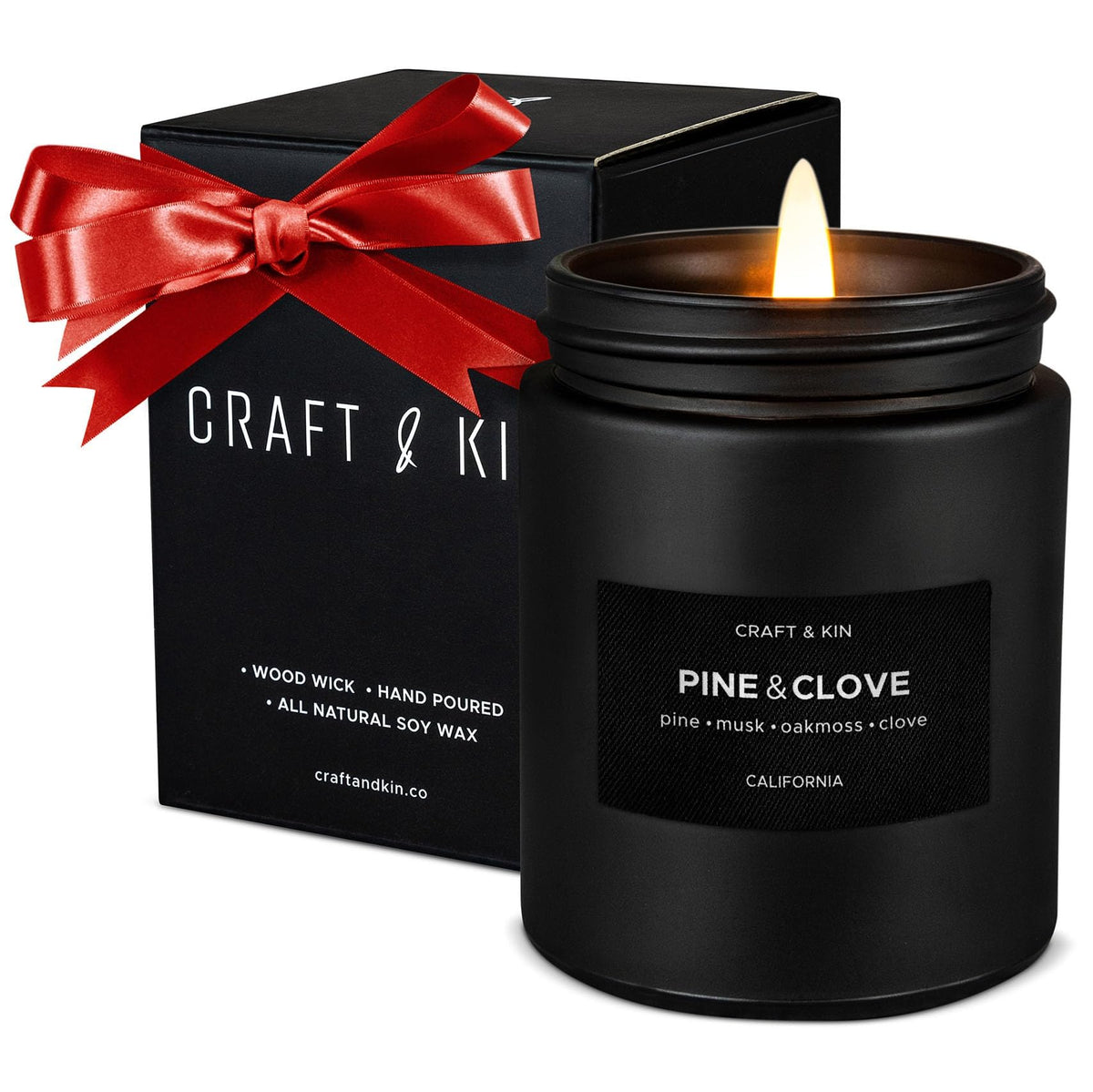Craft & Kin premium pine & clove candle in black packaging enhances festive ambiance