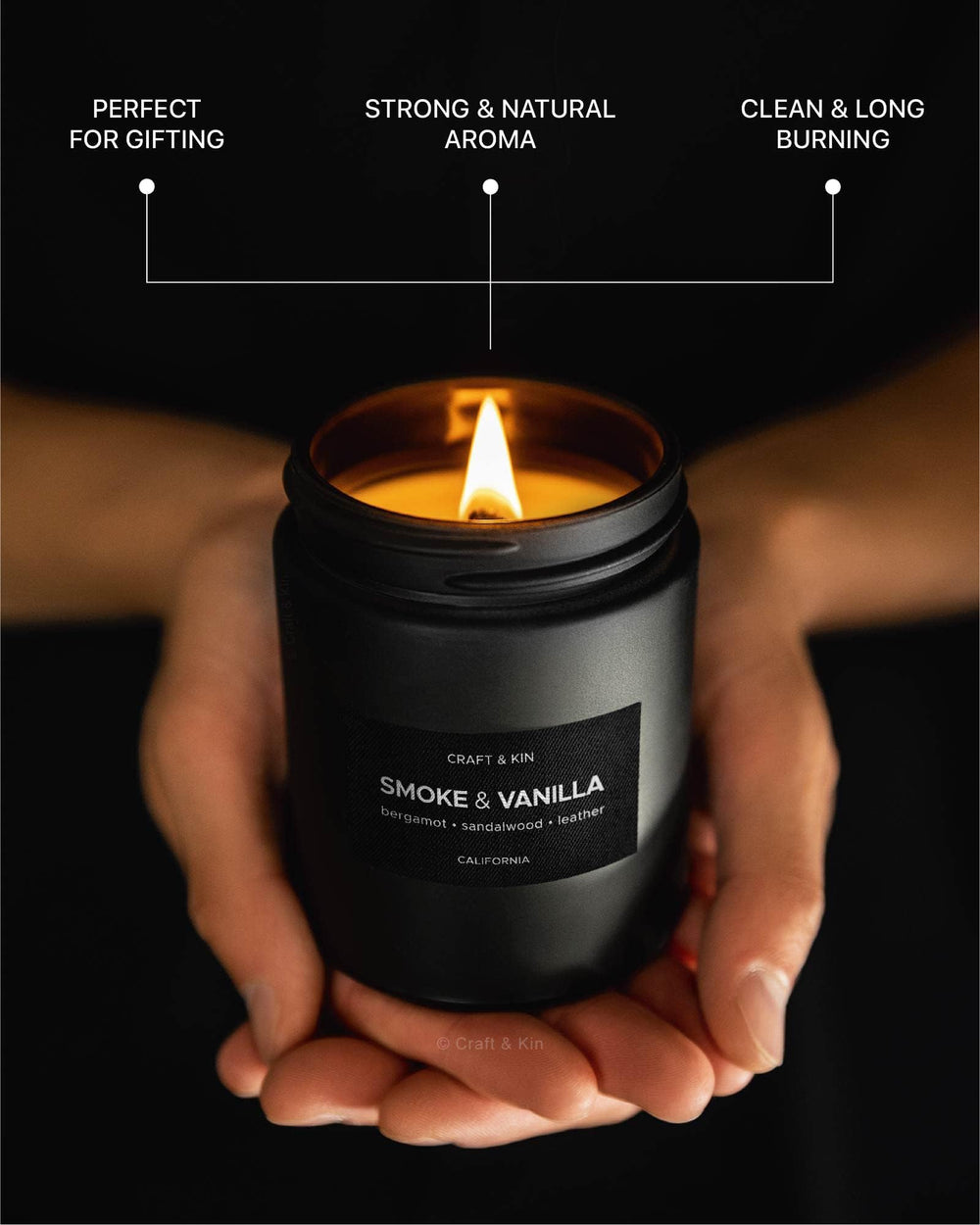 Craft & Kin Premium Candle on a living room table with warm glow.